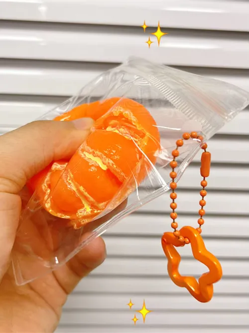 かわいい皮をむいたオレンジの果実型ピンチキーホルダー、ストレス解消、リバウンド、黄色いみかんの放出に。